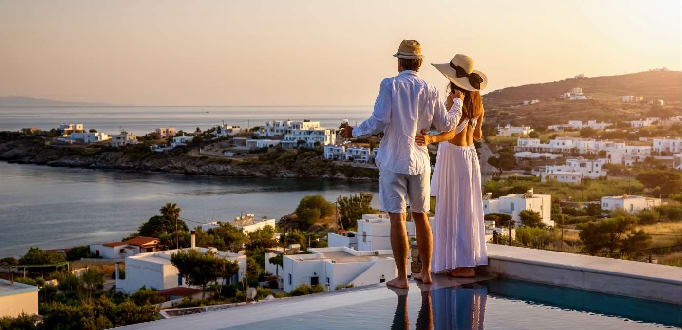 couple looking over into sunset