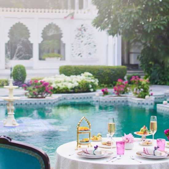 High tea by a courtyard fountain in Indian palace